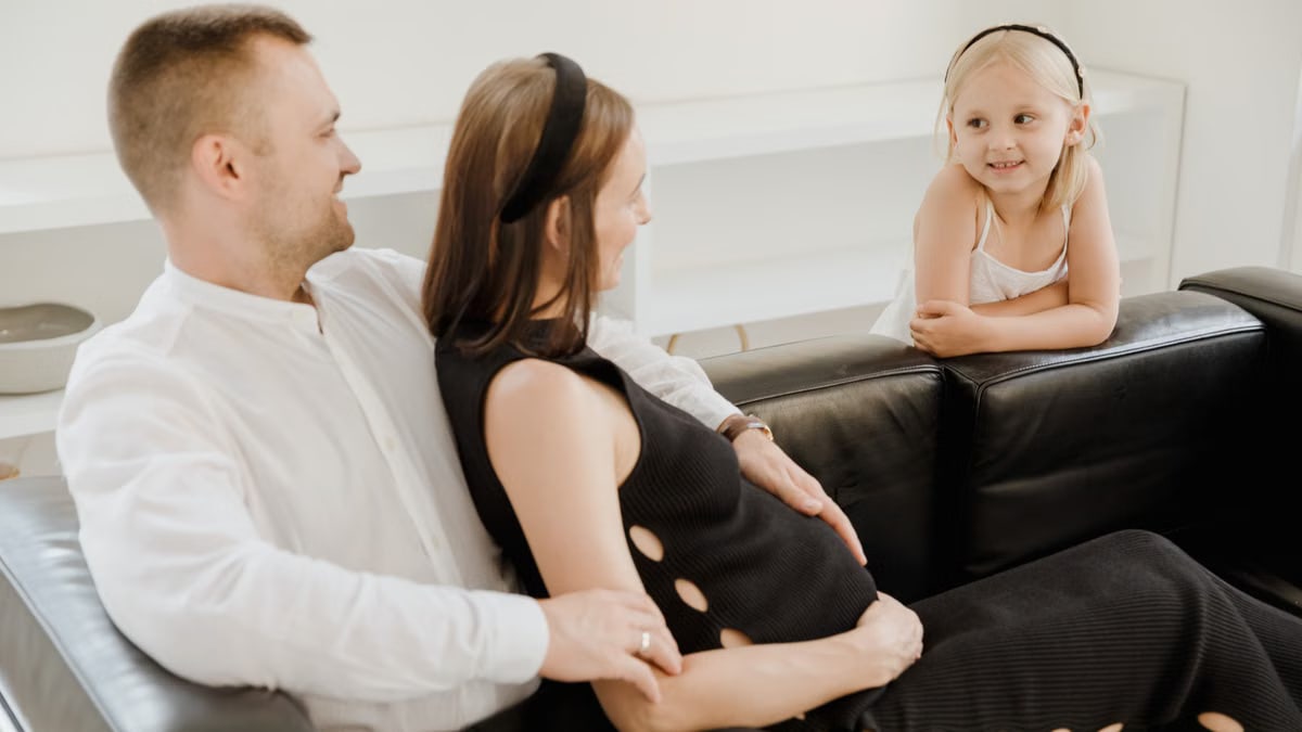 A loving family shares a tender moment, embracing joy and connection.
